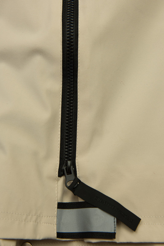 Bézs színű átmeneti parka derékban behúzással