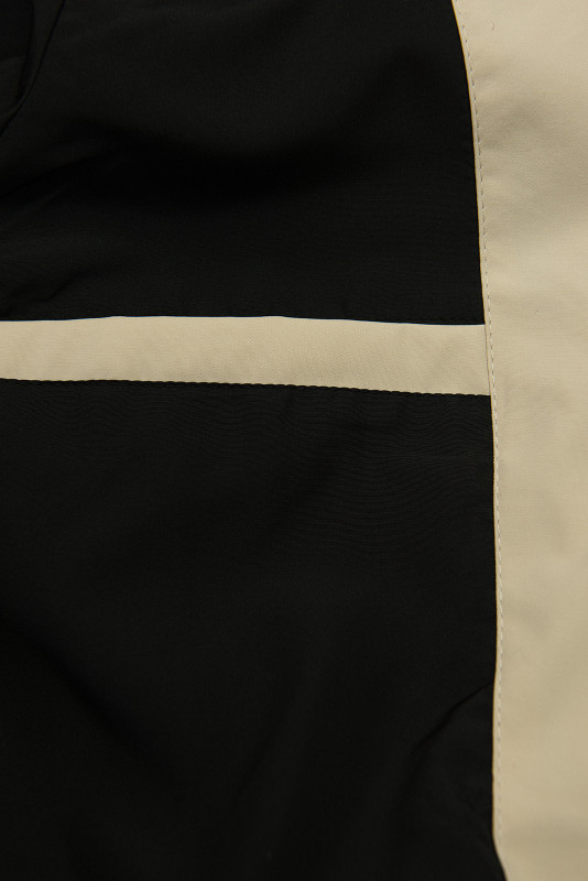 Bézs színű átmeneti parka derékban behúzással