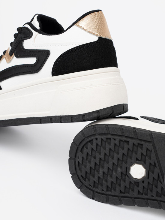 Fekete-fehér színű sneaker cipő aranyszínű részletekkel