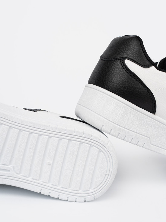 Stílusos fekete-fehér színű sneaker cipő csillogó részletekkel