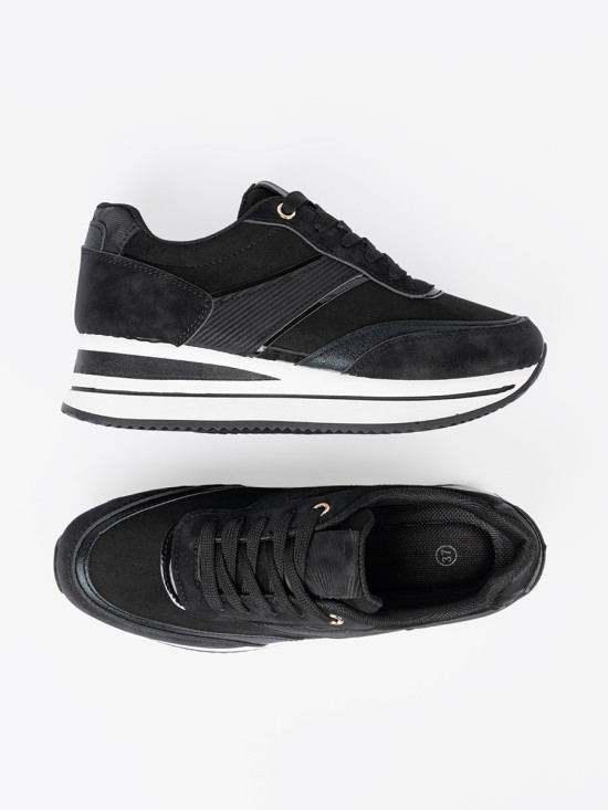 Fekete színű sneaker cipő fényes részletekkel