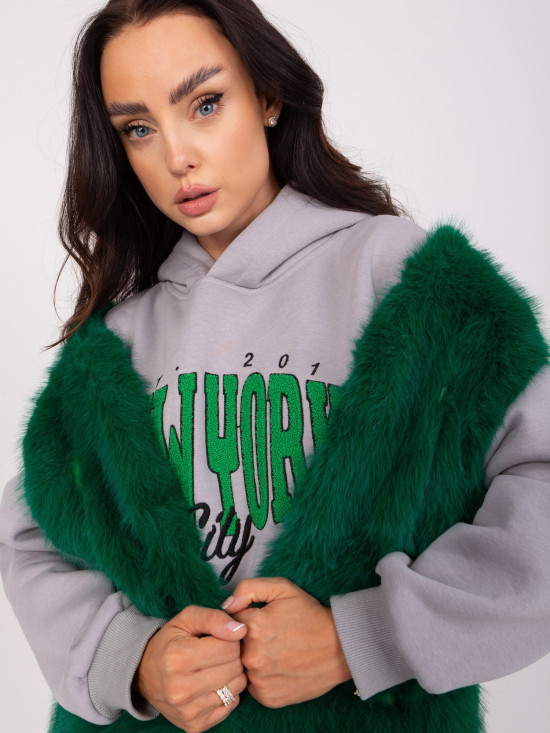 Sötétzöld színű női műszőrme mellény