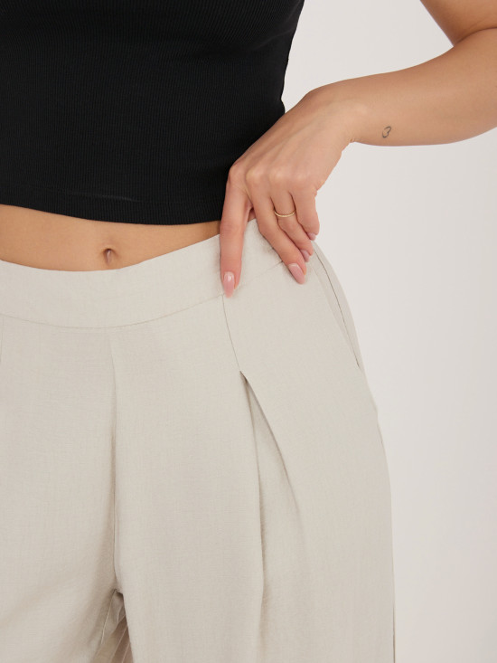 Bézs színű visszkózból készült palazzo nadrág