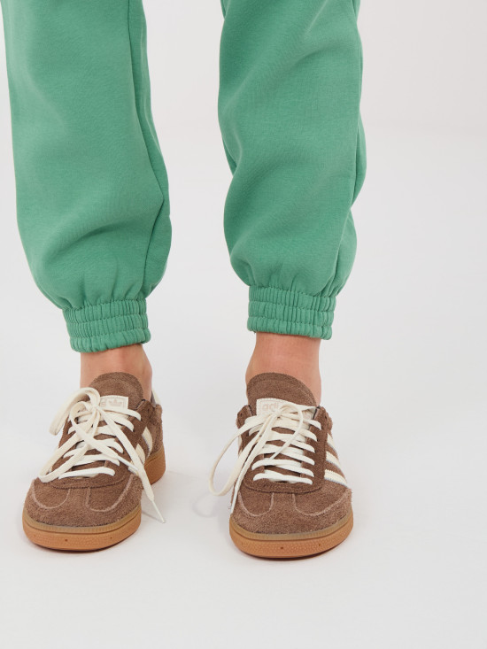 Pisztáciazöld színű melegítőnadrág magas derékkal