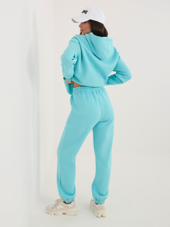 Türkiz színű női melegítő szett kapucnival és hosszú ujjal