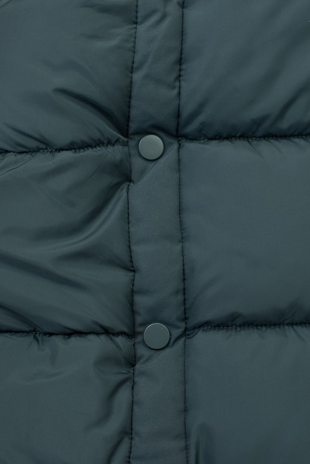 Petrolzöld színű hosszú téli kabát műszőrmével