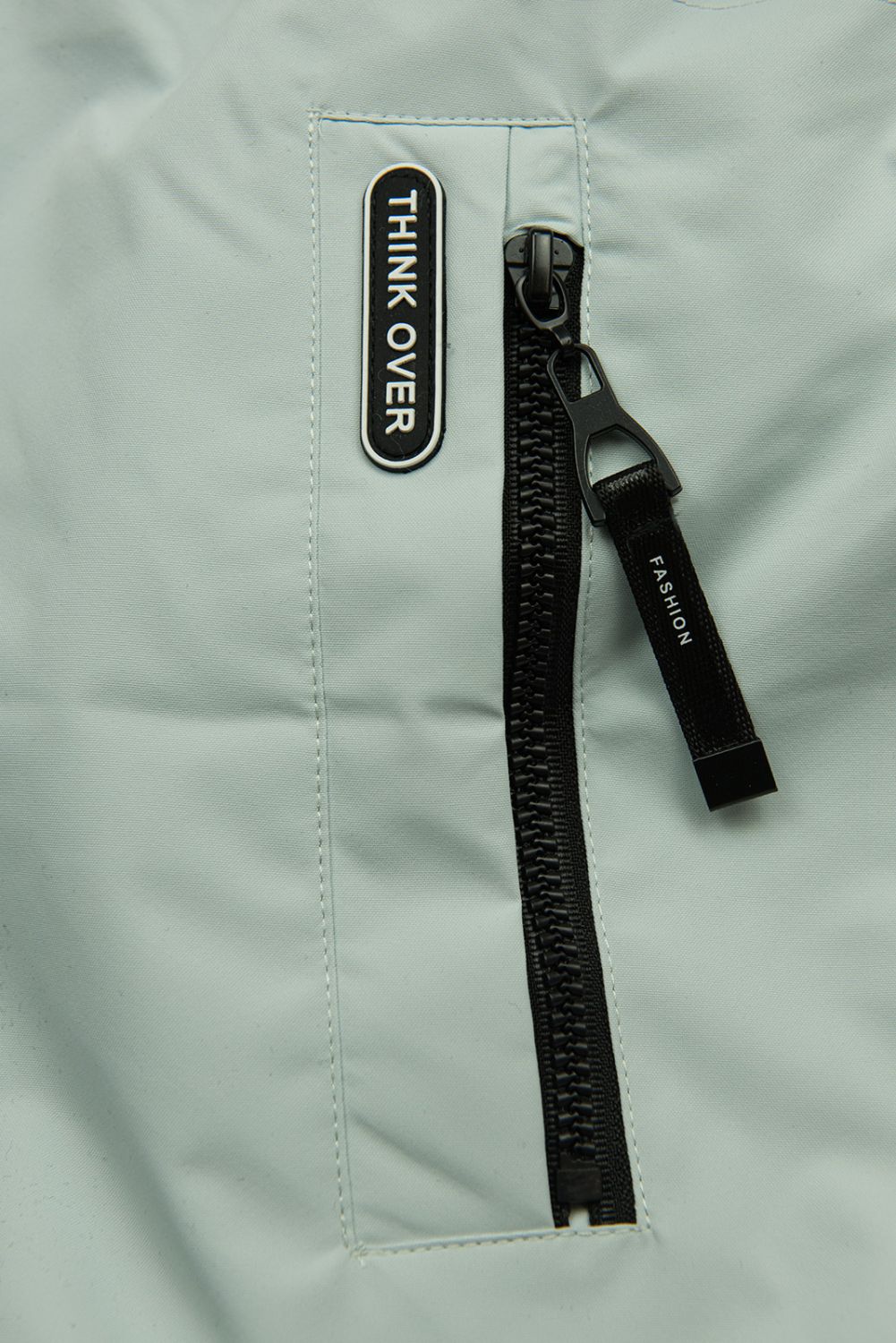 Mentazöld színű tavaszi parka magas gallérral