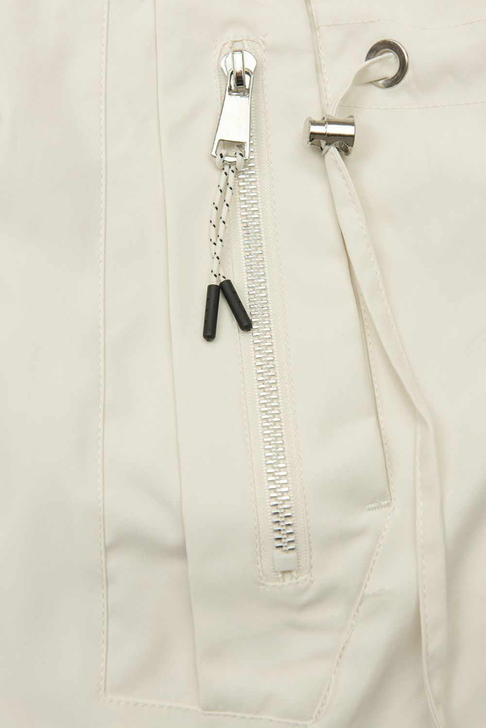 Hosszított parka mintás béléssel a kapucniban - ekrü színű