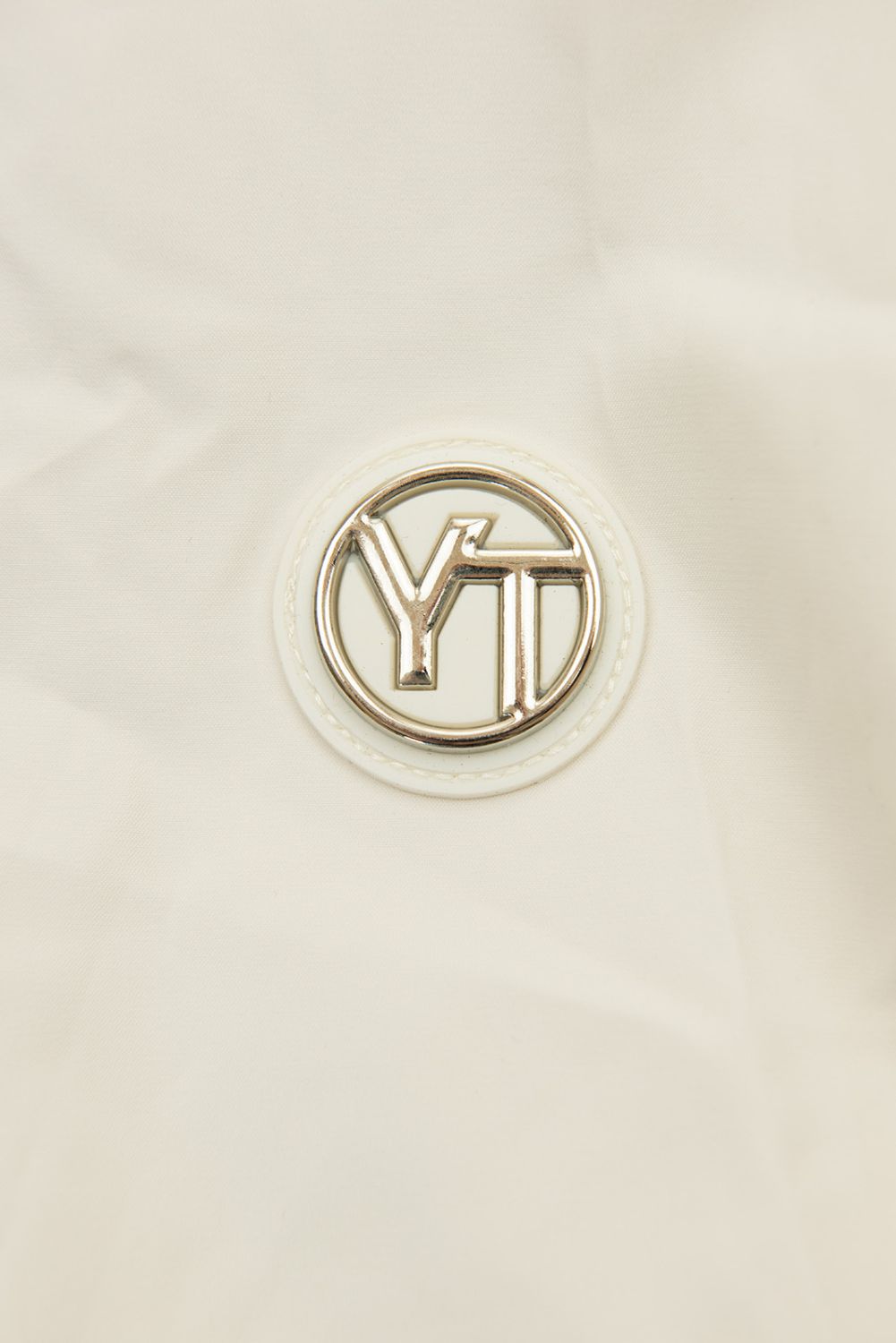 Ekrü színű tavaszi parka nagy kapucnival