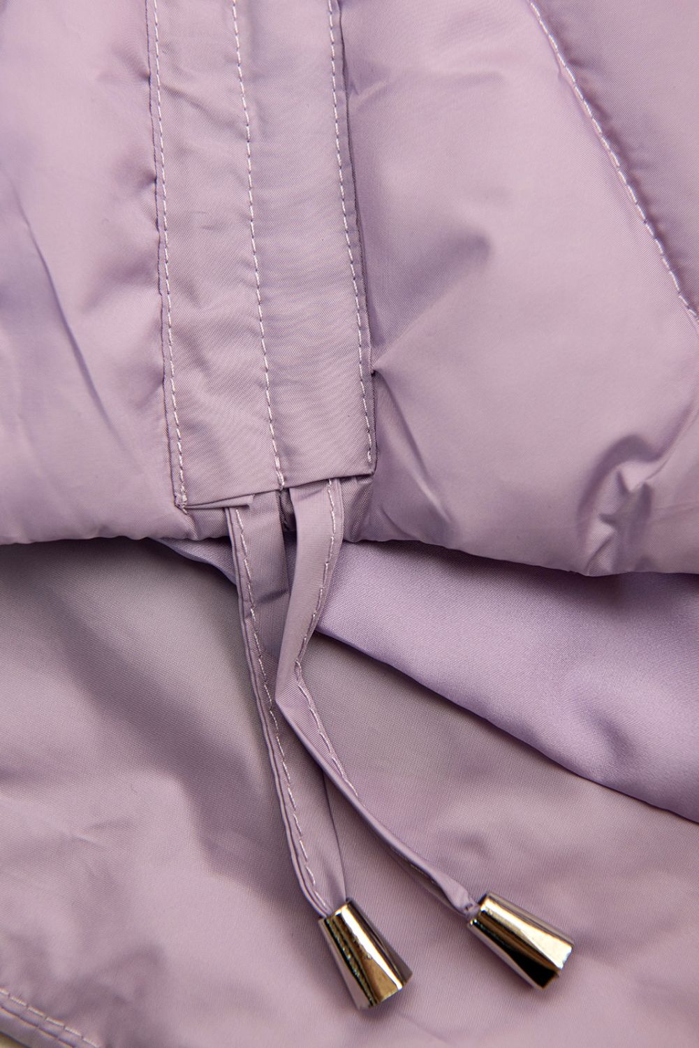 Világoslila színű hosszított mellény