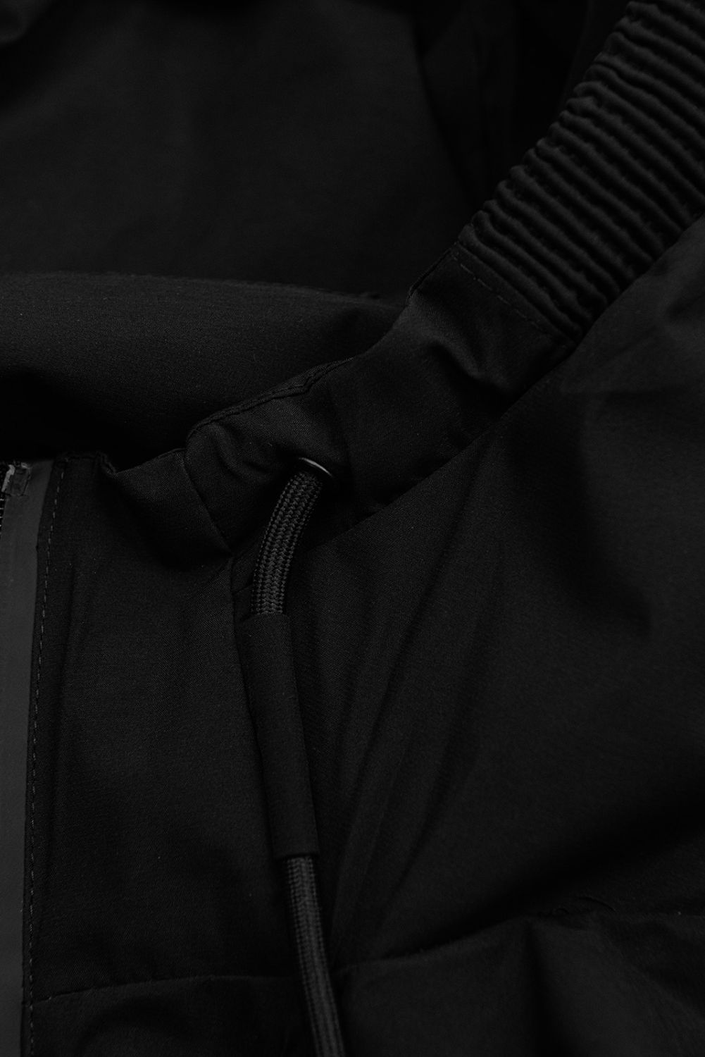 Fekete színű tavaszi parka kétutas cipzárral