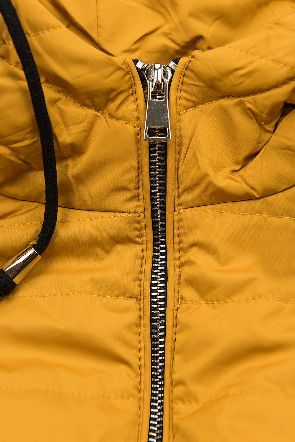 Mustársárga színű steppelt könnyű kabát