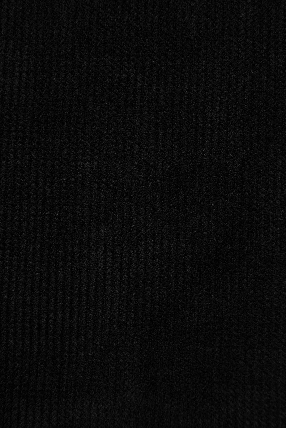 Fekete színű laza nadrág derekán gumival