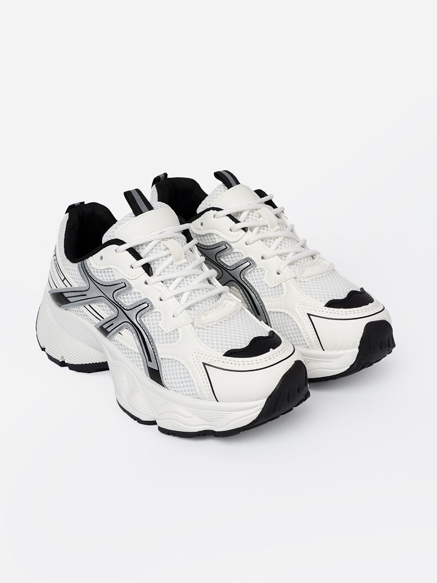 Fehér-fekete színű kényelmes sneaker cipő hálós anyaggal