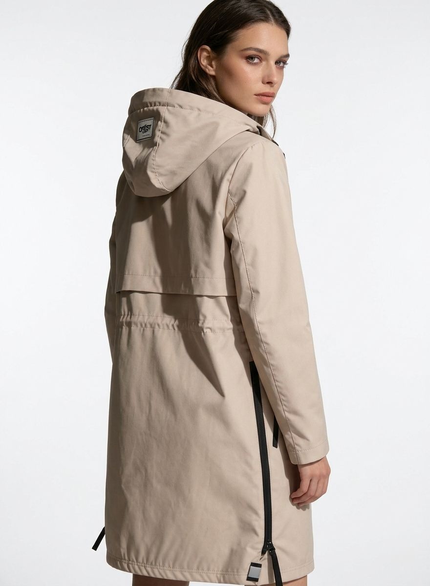 Bézs színű átmeneti parka derékban behúzással