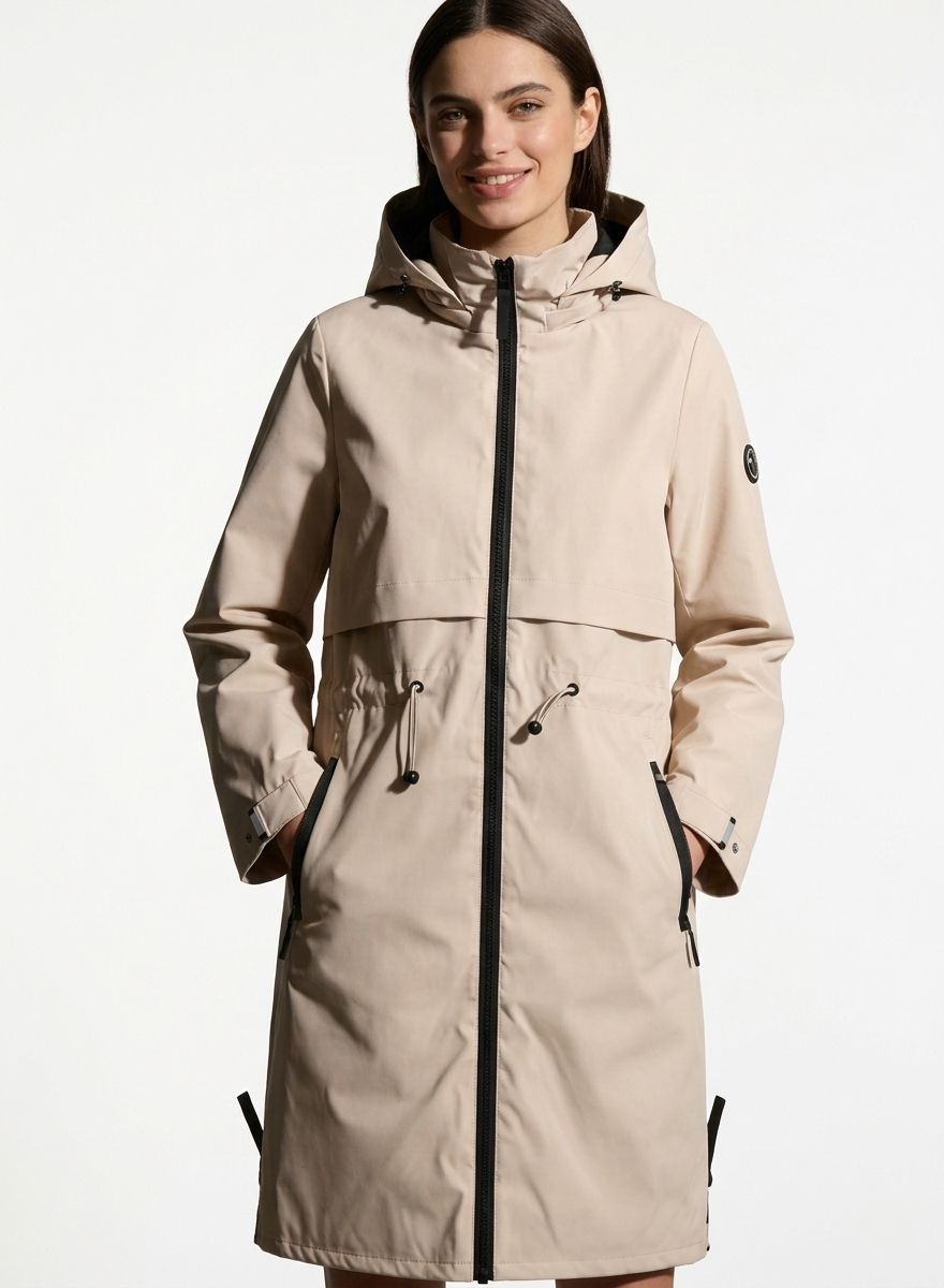 Bézs színű átmeneti parka derékban behúzással