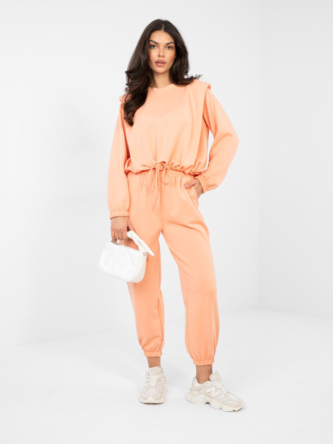 Női narancssárga színű szett megkötéssel és hosszú ujjakkal