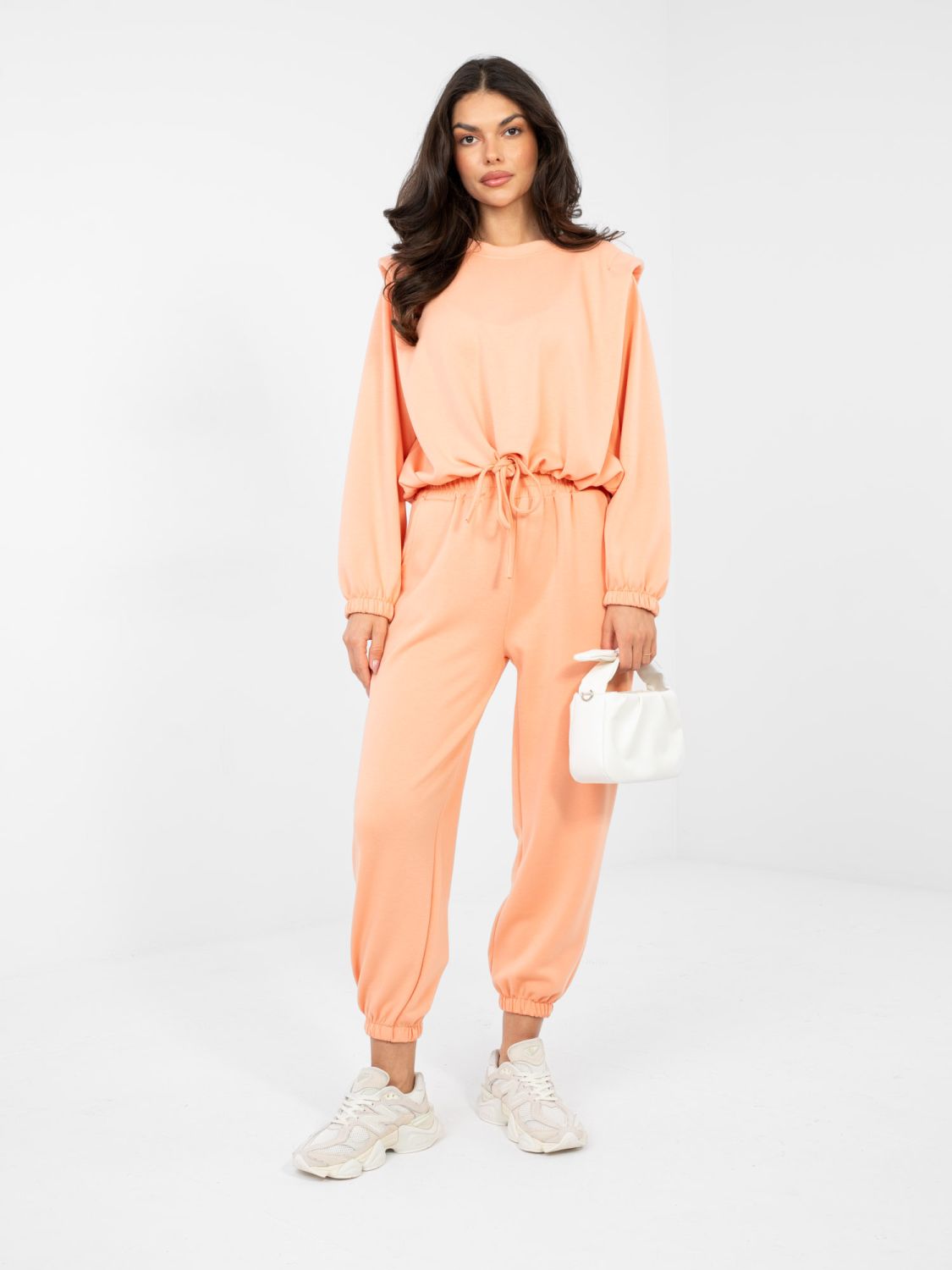 Női narancssárga színű szett megkötéssel és hosszú ujjakkal