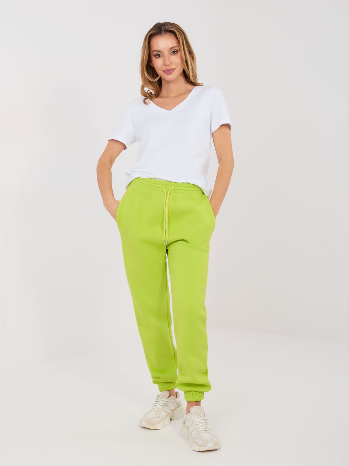 Limezöld színű női melegítőnadrág magas derékkal