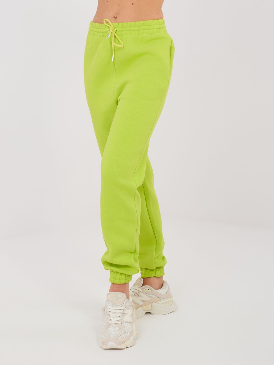 Limezöld színű női melegítőnadrág magas derékkal