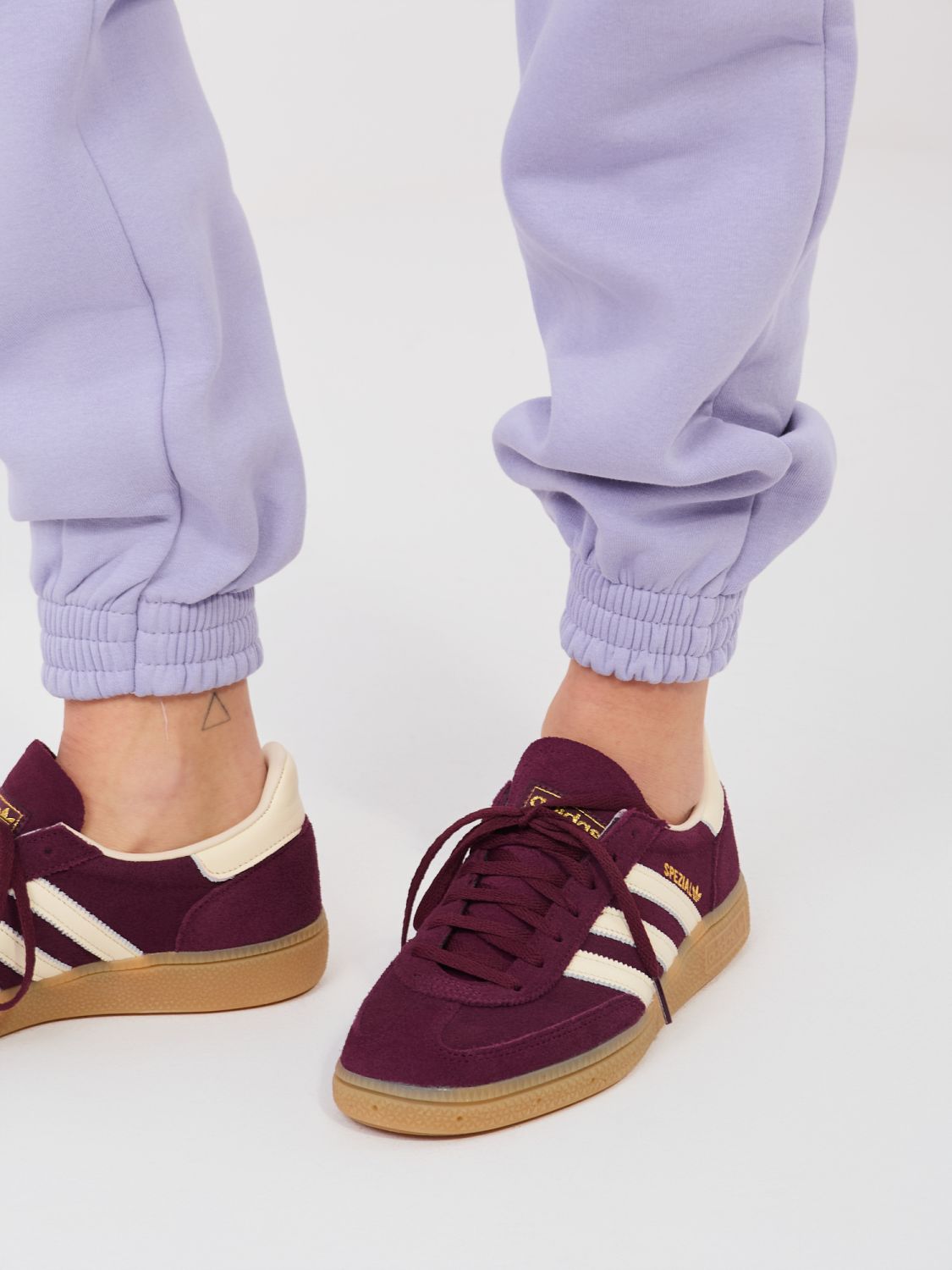 Női világoslila színű melegítőnadrág magas derékkal