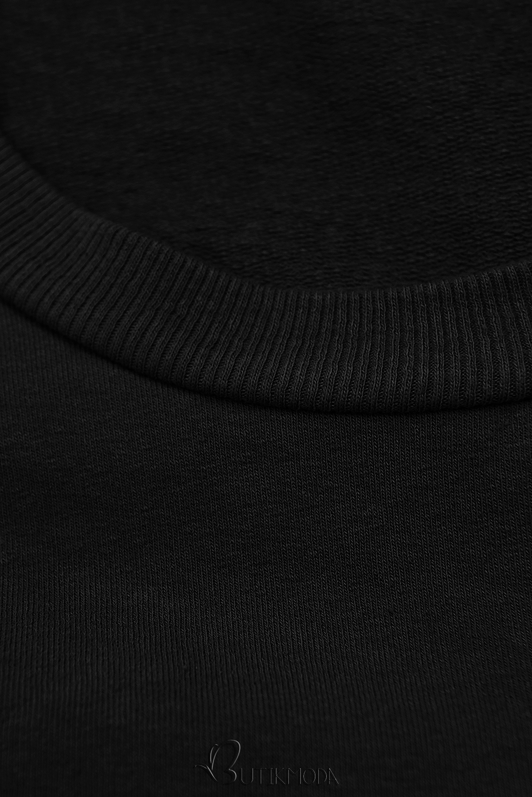 Fekete színű laza melegítőruha