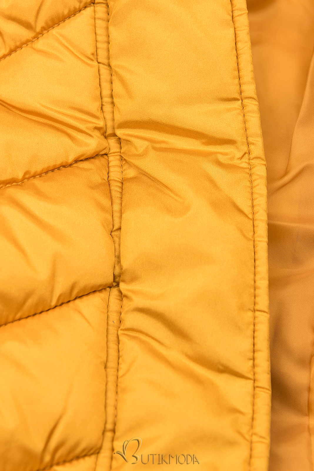 Téli steppelt kabát övvel - sárga színű