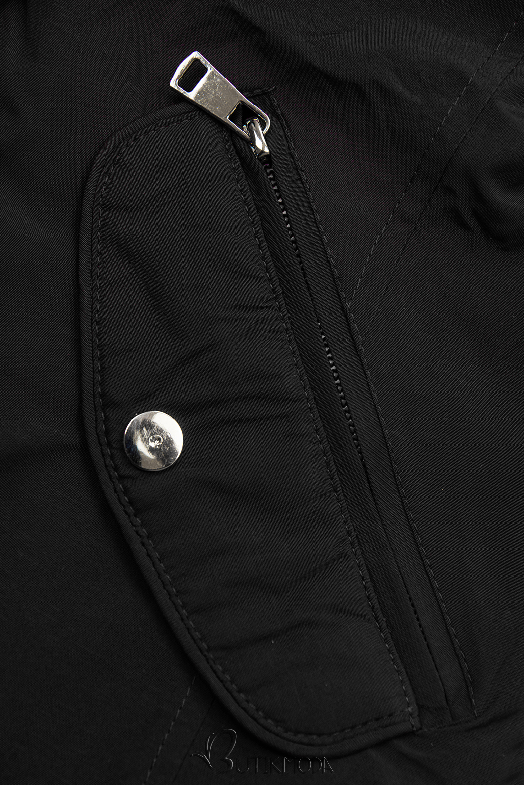 Fekete színű kifordítható kabát pepita mintával