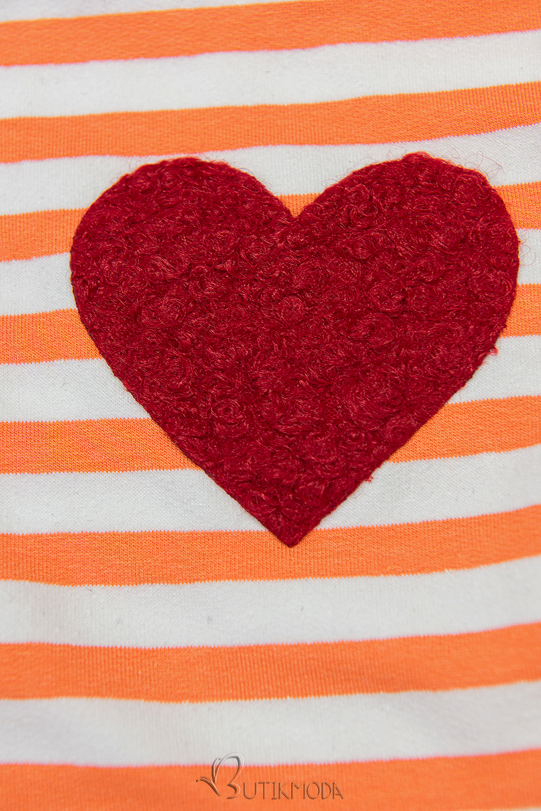Narancssárga és féhér színű csíkos póló