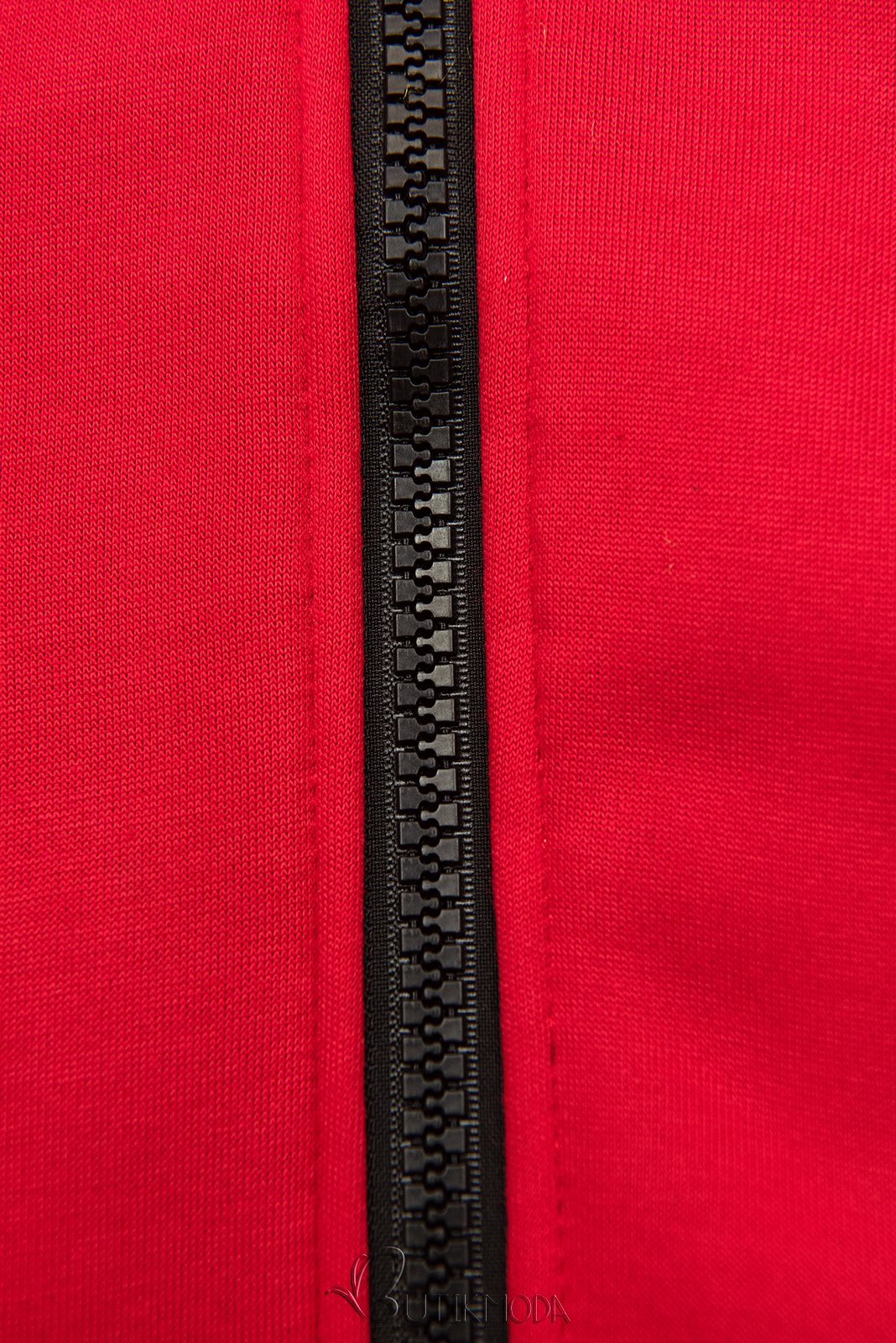 Piros színű sportos felső hosszított fazonban