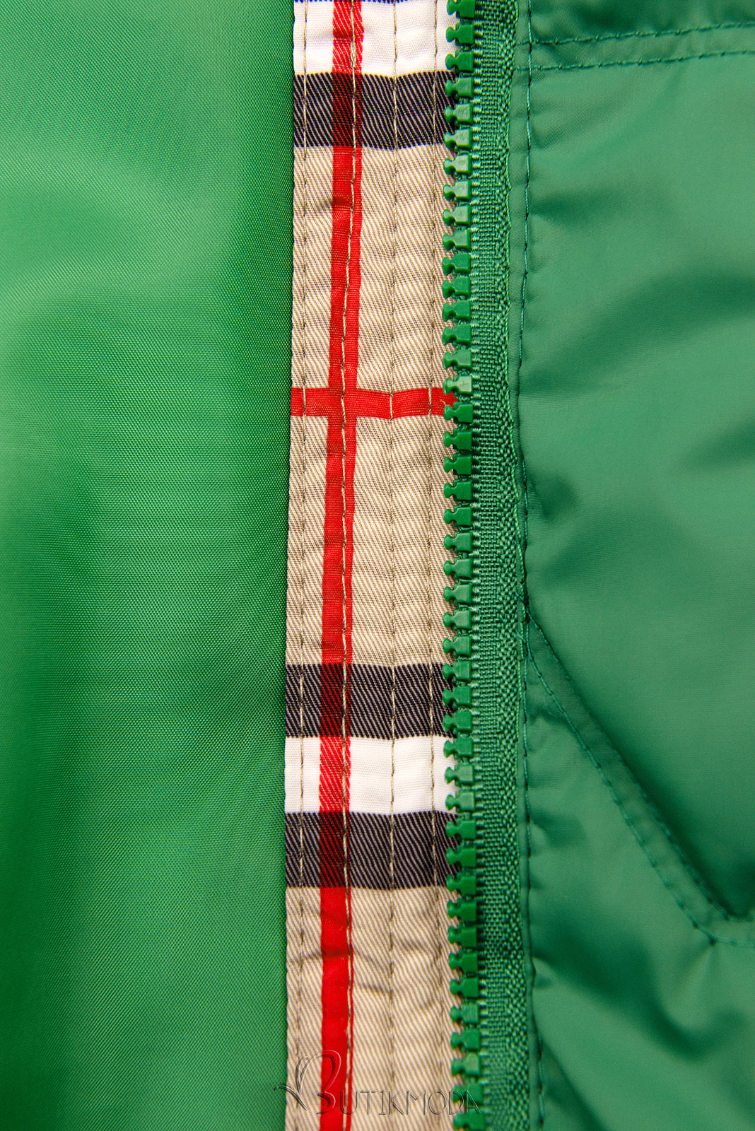 Zöld színű átmeneti dzseki kockás szegéllyel