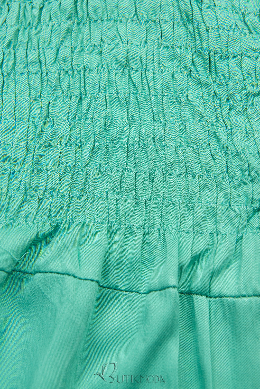 Türkizzöld színű overál nadrág