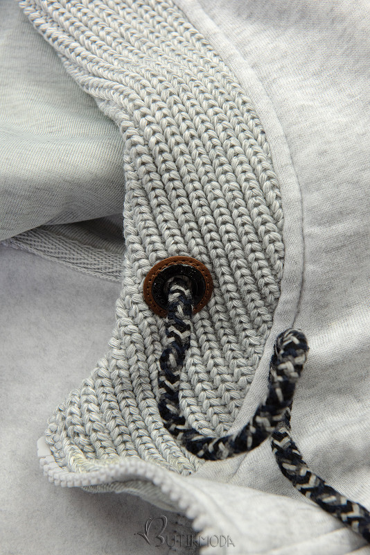 Világosszürke színű felső dekoratív kötéssel