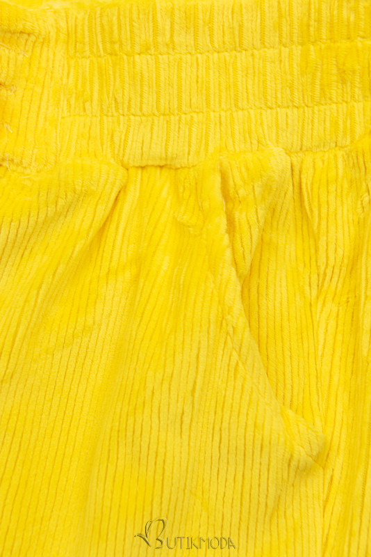 Sárga színű nadrág derékban behúzással
