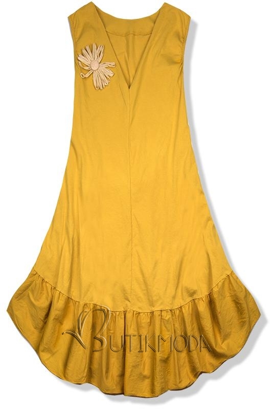 Sárga színű ruha brossal