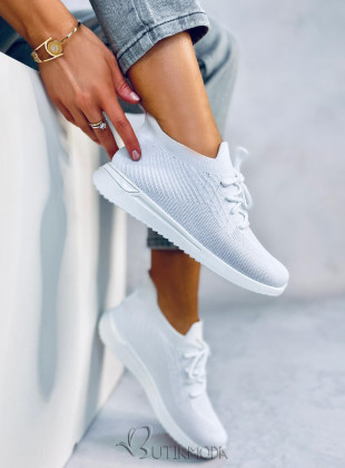 Elasztikus anyagból készült fehér színű női tornacipő