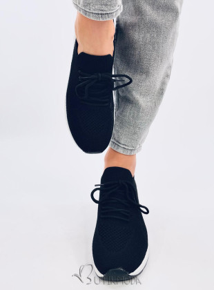 Elasztikus anyagból készült fekete színű női tornacipő