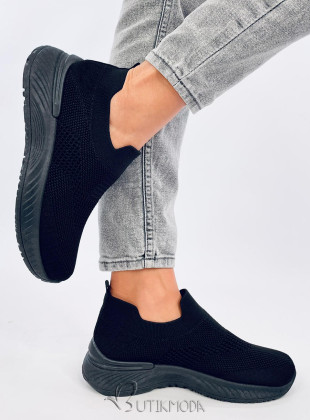Fekete színű tornacipő elasztikus felülettel
