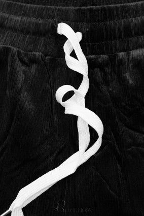 Fekete színű laza nadrág kordbársony mintával