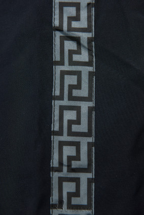 Sötétkék és szürke színű steppelt kifordítható kabát