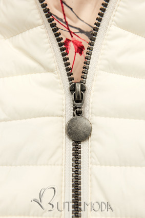 Fehér színű steppelt dzseki mintás béléssel