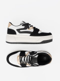 Fekete-fehér színű sneaker cipő aranyszínű részletekkel