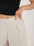 Bézs színű visszkózból készült palazzo nadrág