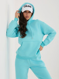 Türkiz színű női melegítő szett kapucnival és hosszú ujjal