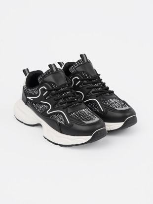 Fekete női sneakers díszítő betétekkel