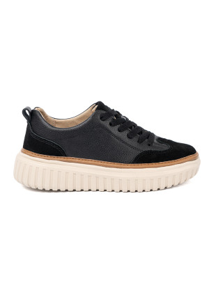Fekete színű bőrből készült sneaker bézs színű platformon