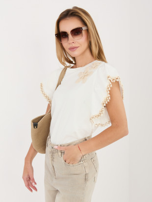 Fehér blúz applikációval